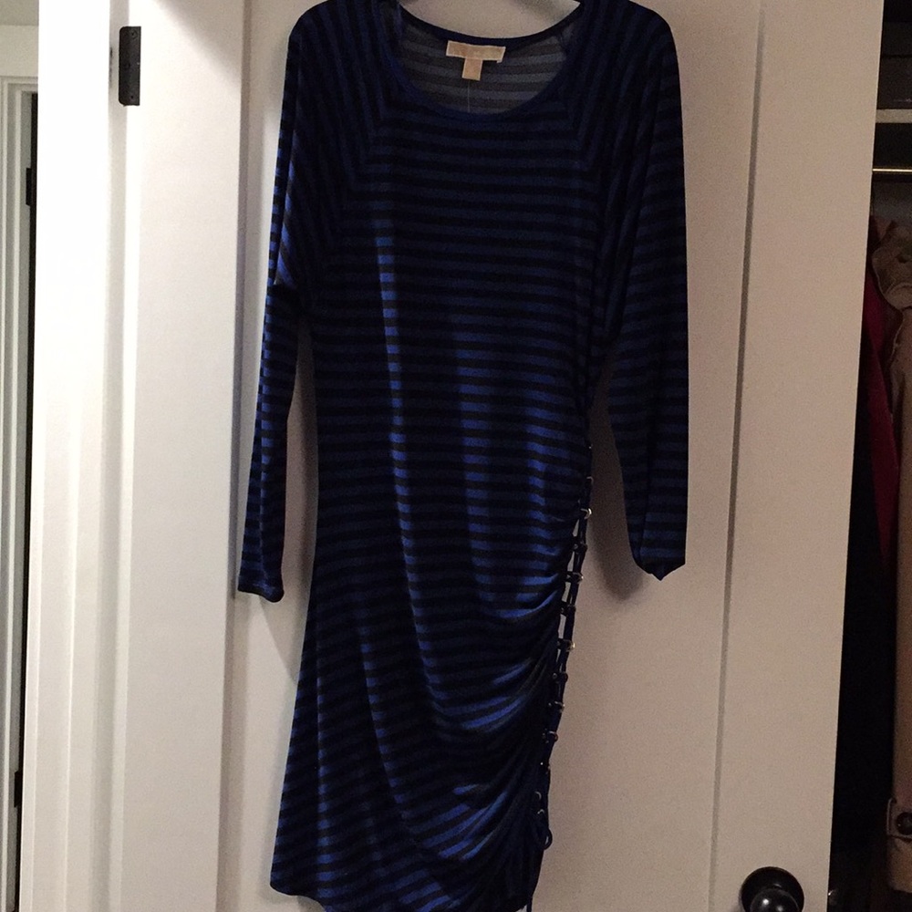 MK stretch cocktail dress with Vegas flare.